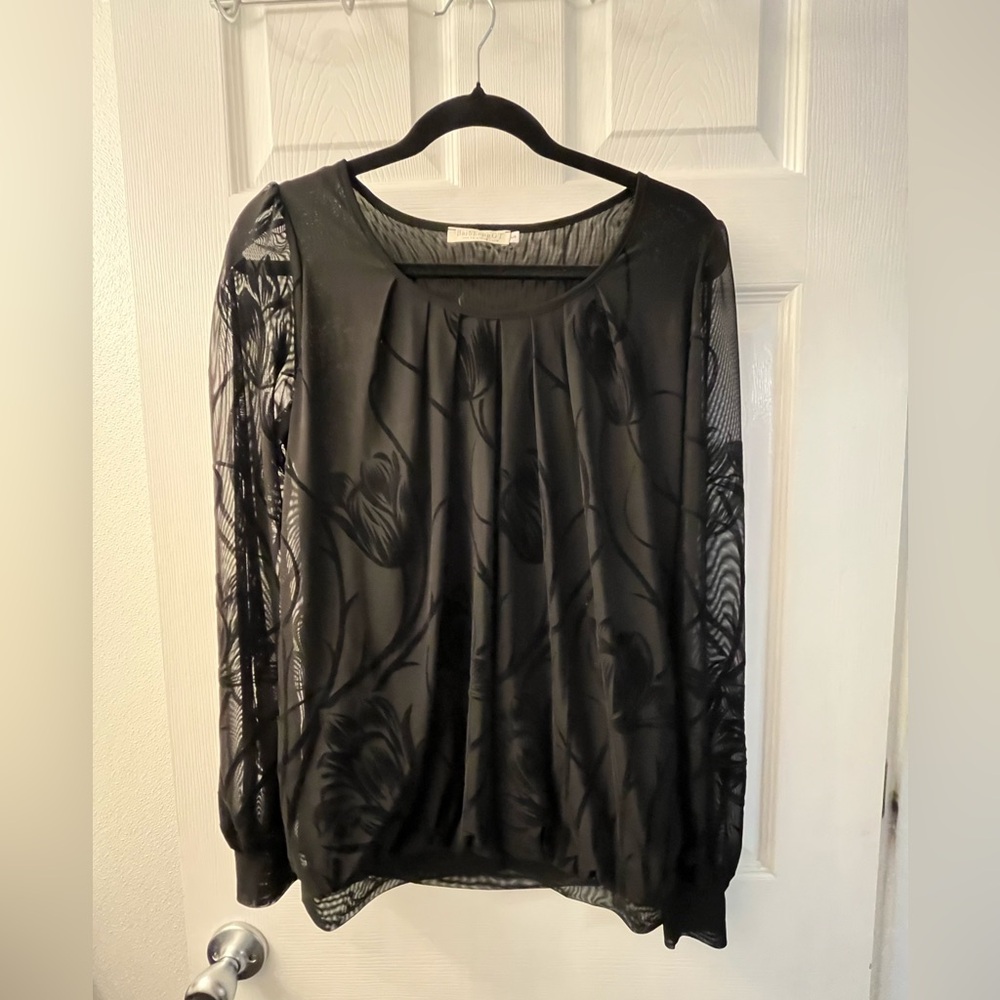 BaiShengGT size small sheer black long sleeve with flowered detail.